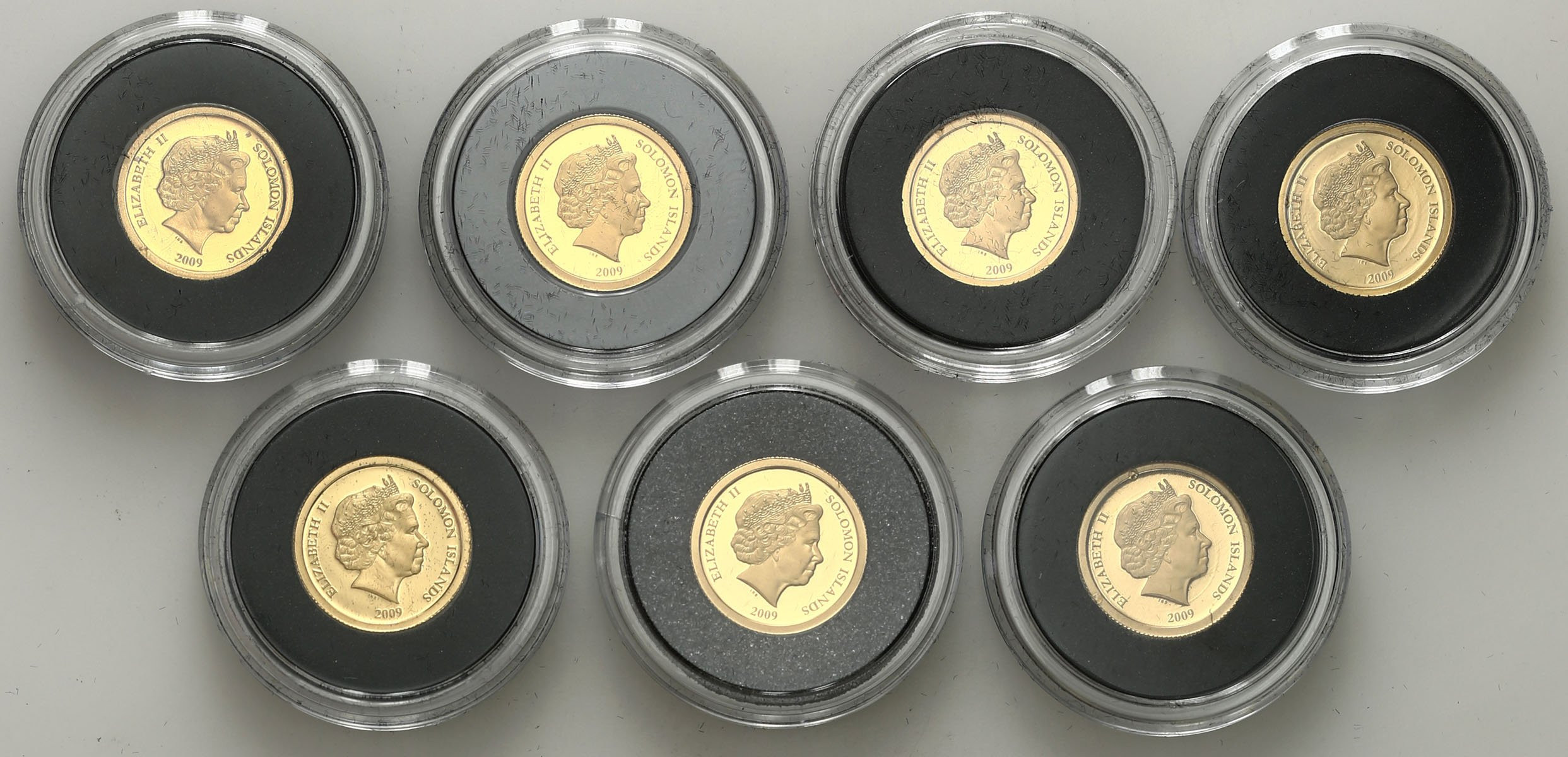 Najmniejsze monety świata zestaw 7 szt. ZŁOTO
